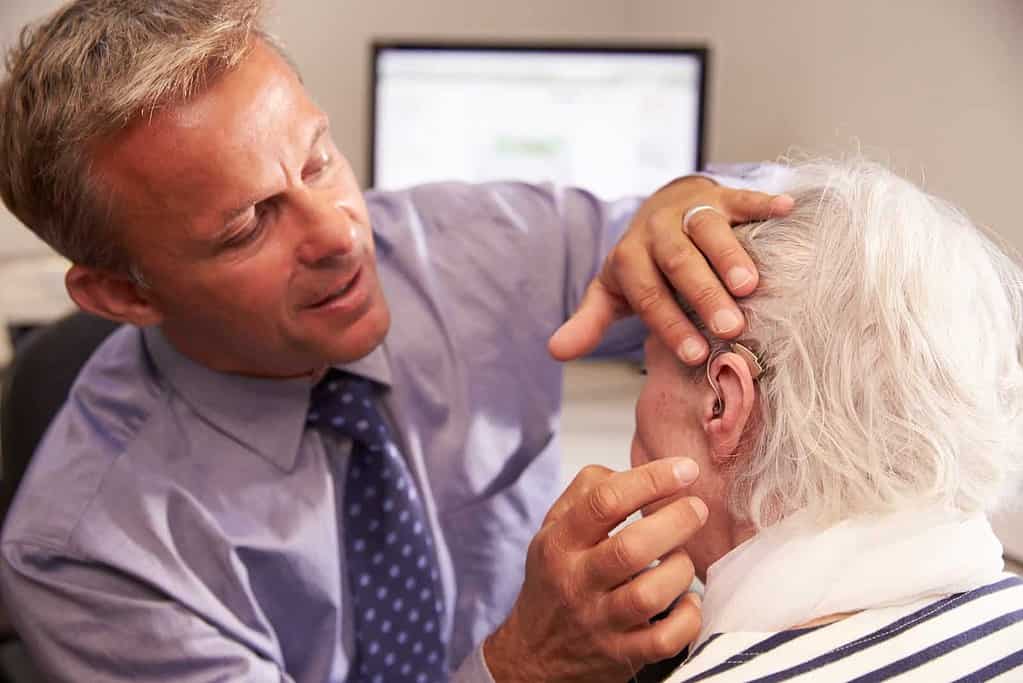 doctor checking patient