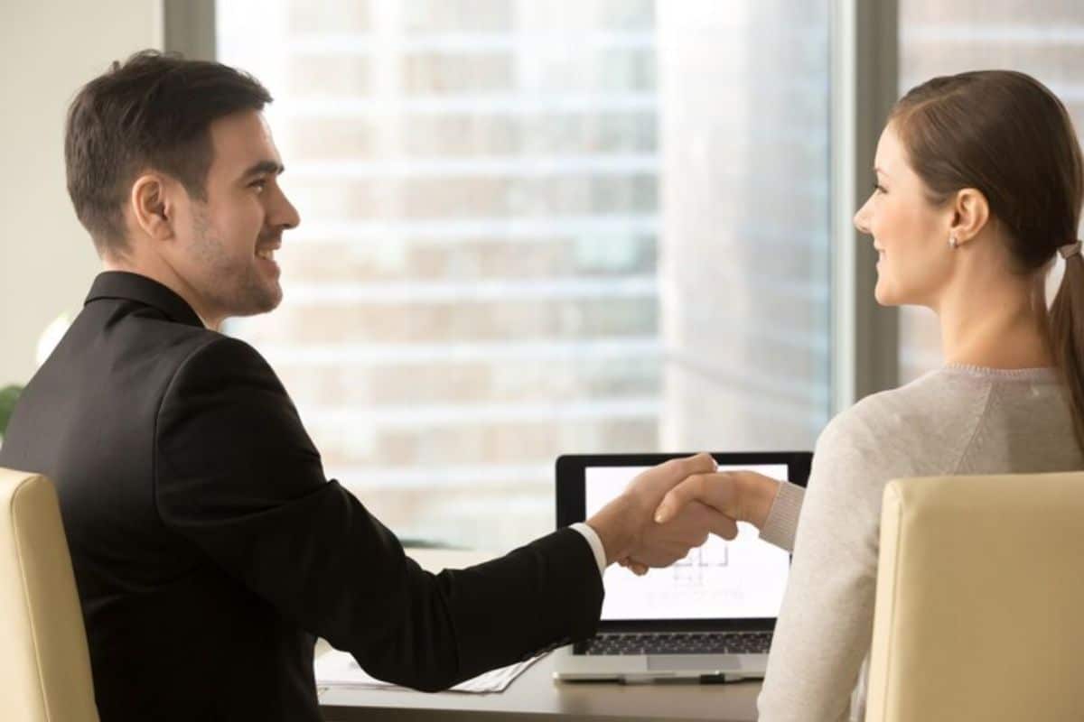 executives shaking hand