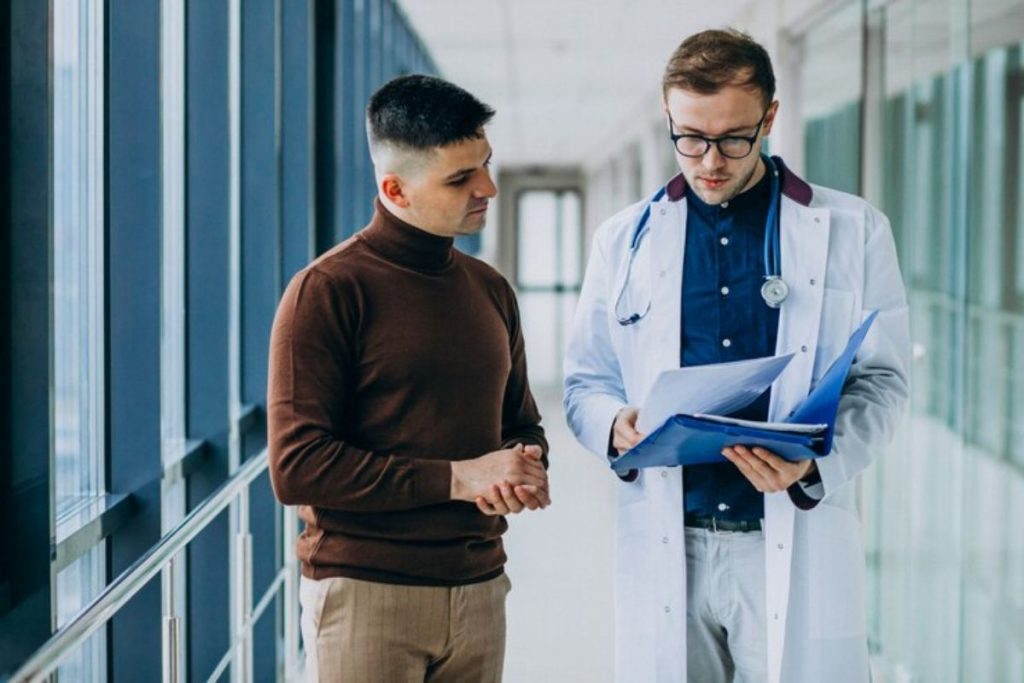 doctor going through sheet